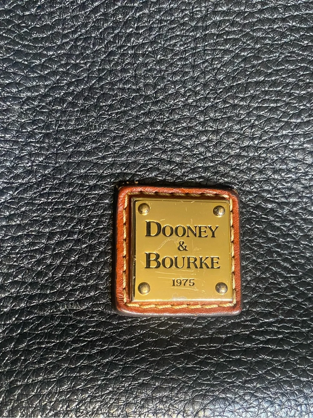 Dooney & Bourke Black Pebble Leather Messenger with Brown Accents